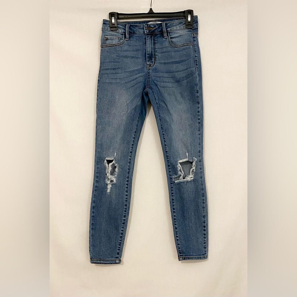 Carly Jean size 3 medium wash distressed skinny jeans.